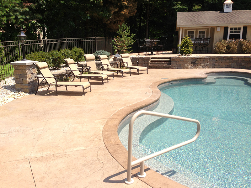 Swimming pool and stamped concrete project example 185